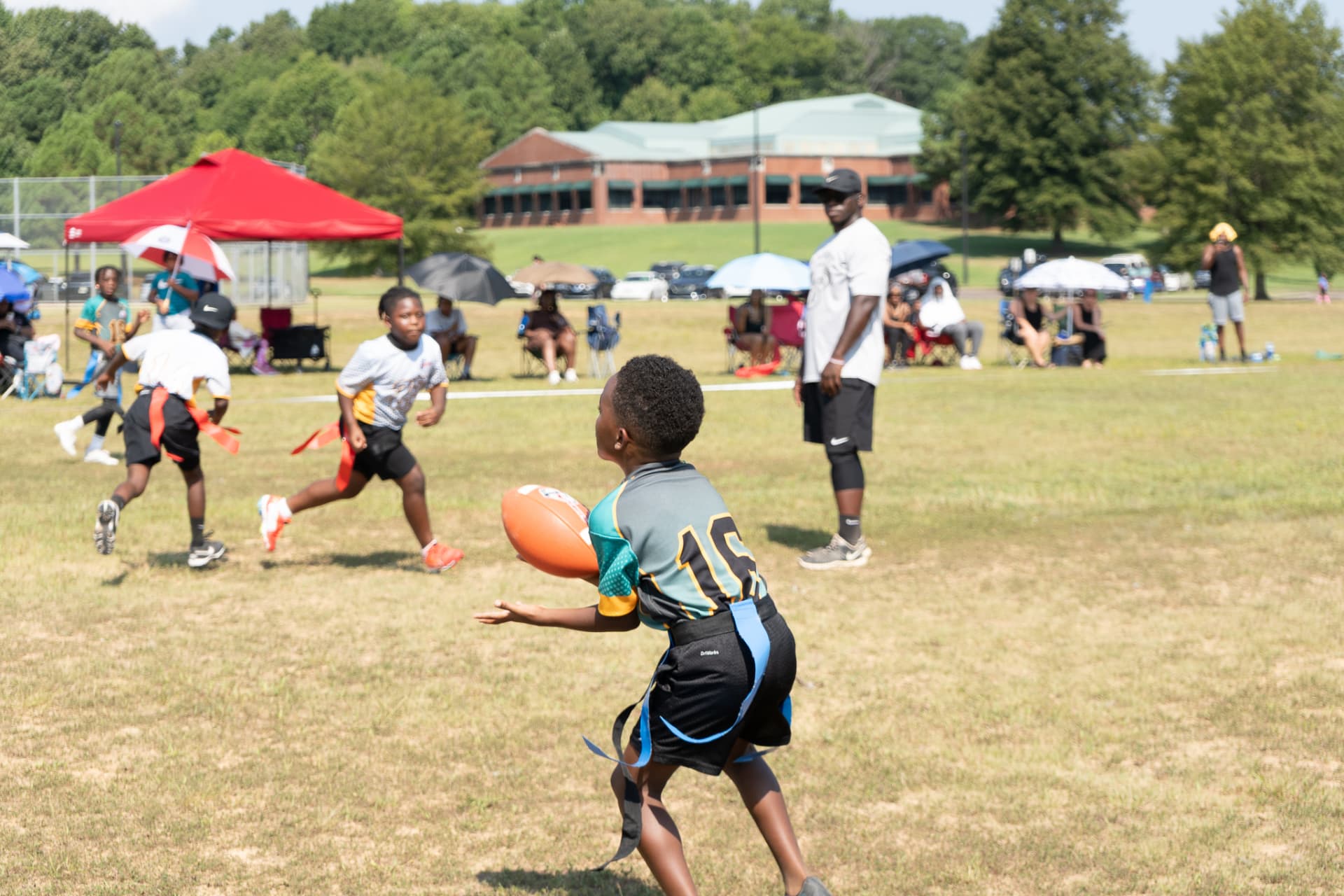 Flag football player catching a pass during a game